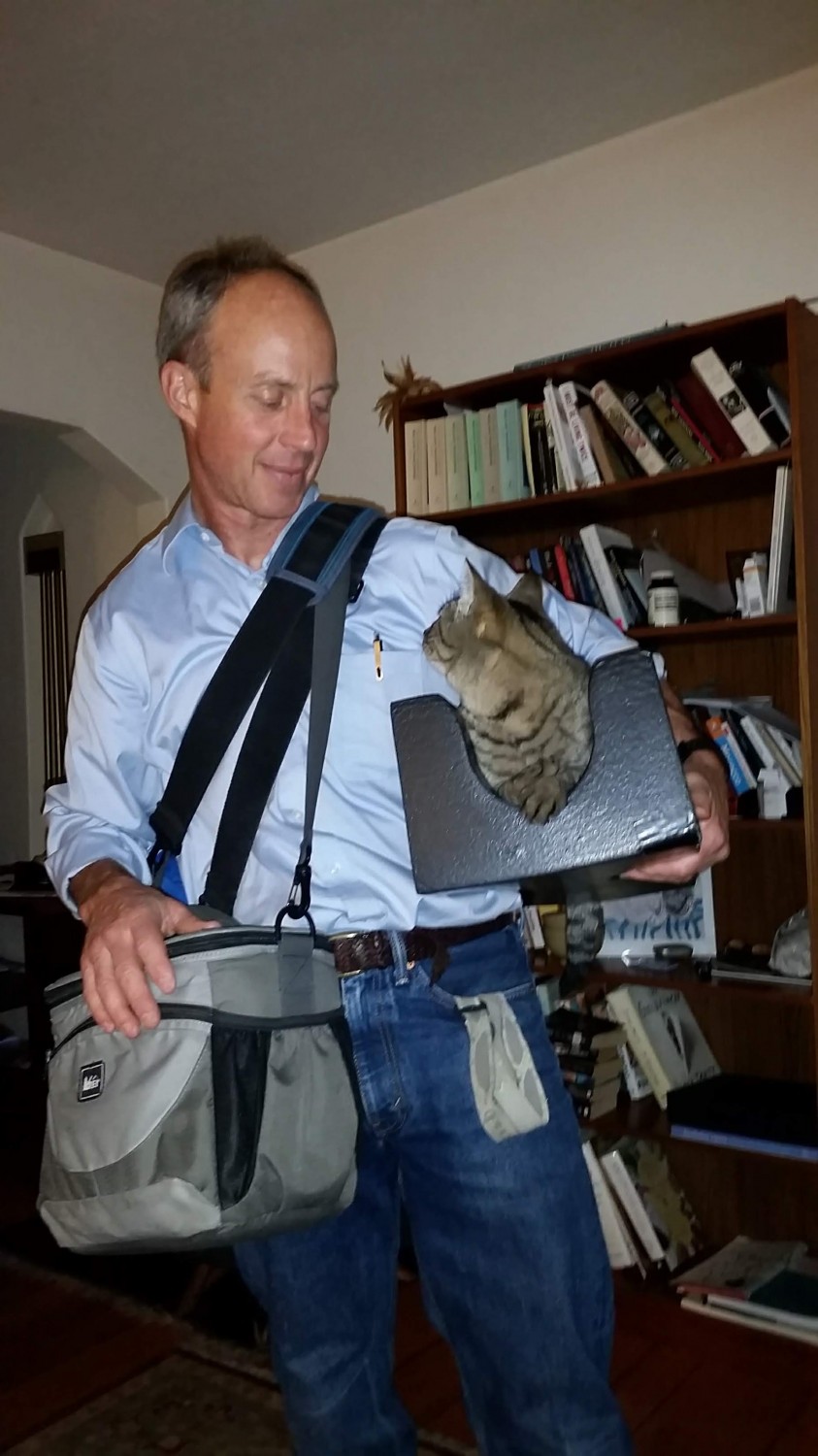 Dr. Grant Holding a Cat in a Box